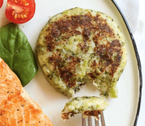 A back-to-school lunch featuring salmon patties and a fork.