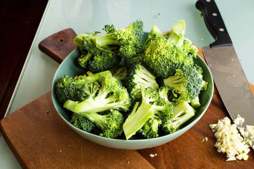 A bowl of nutritious broccoli, highlighting its health benefits.